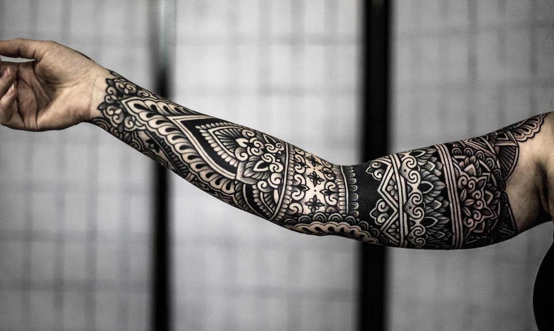 ornamental tattoo artist