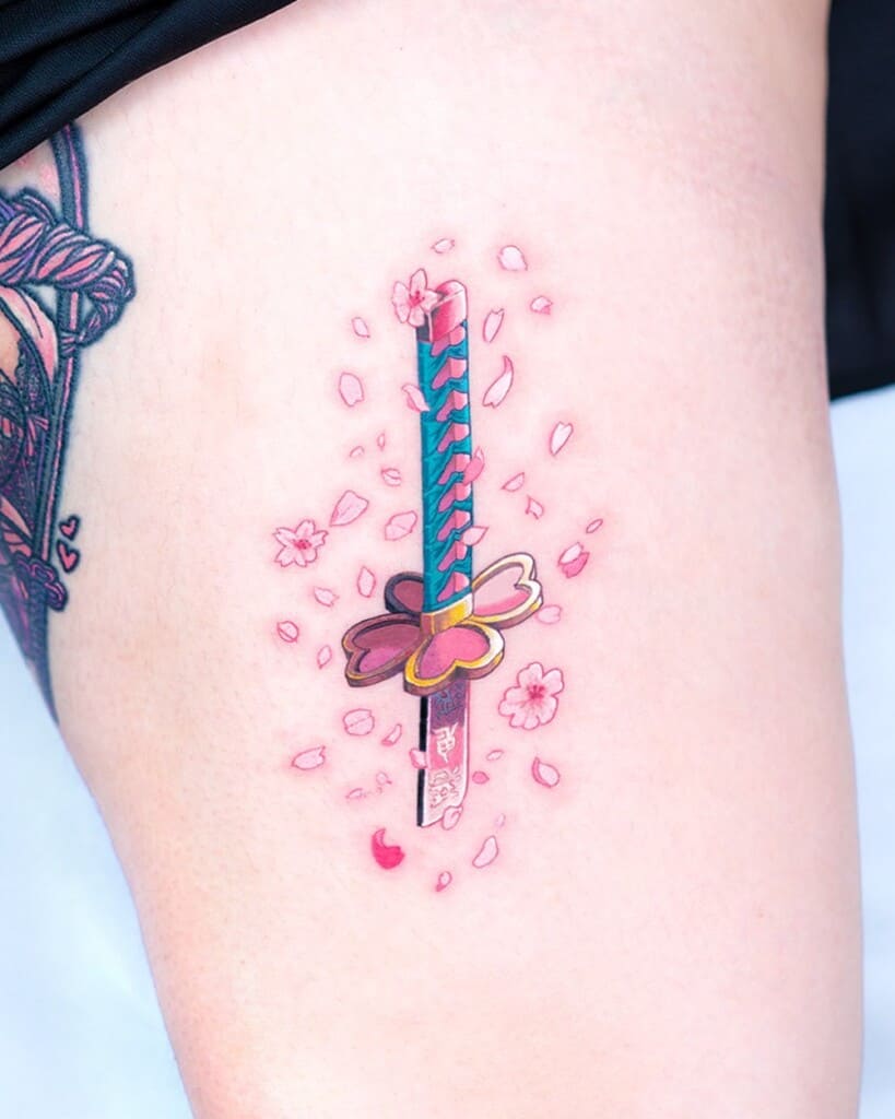 Demon Slayer Nichirin sword tattoo with sakura flowers