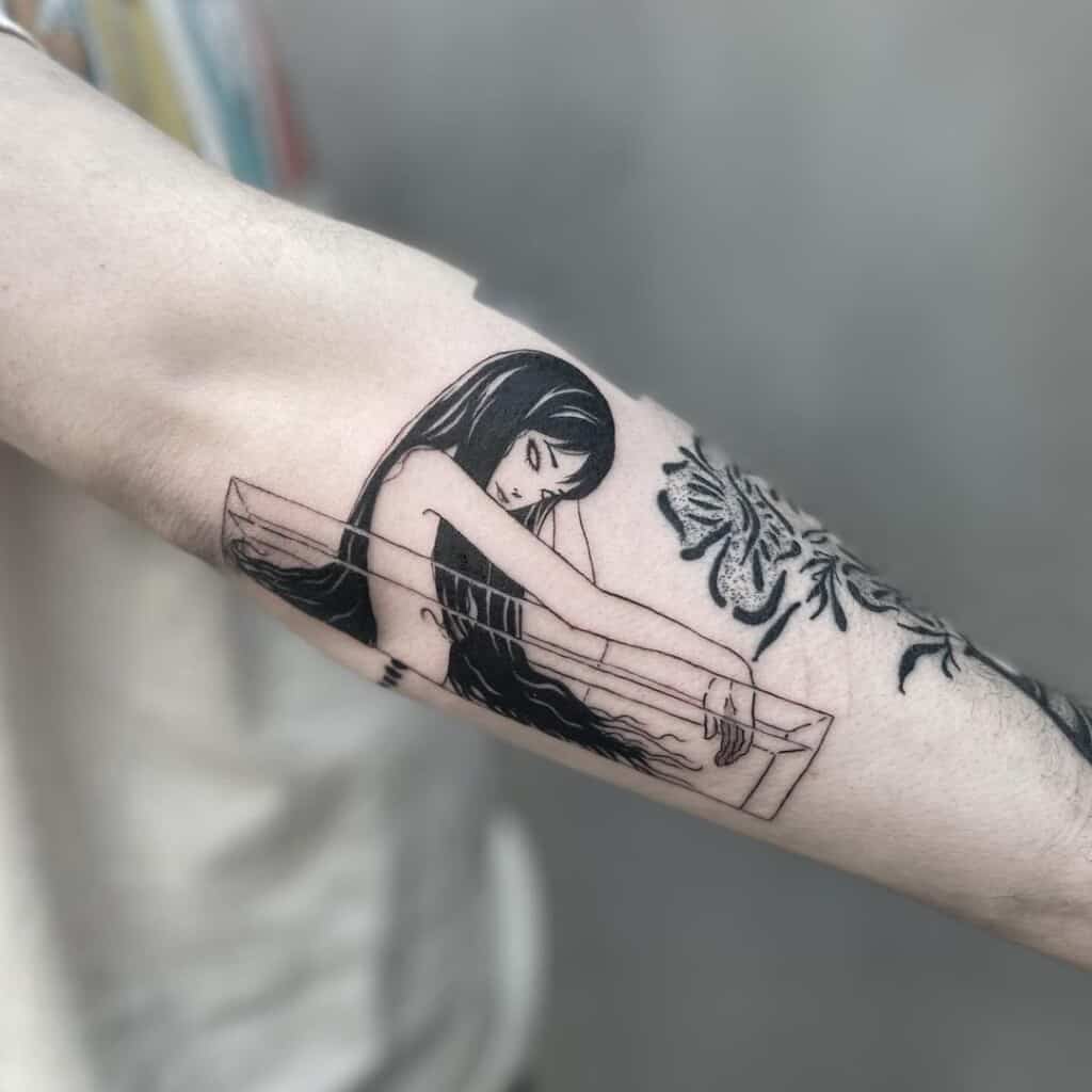 Tomie Kawakami inner arm tattoo design