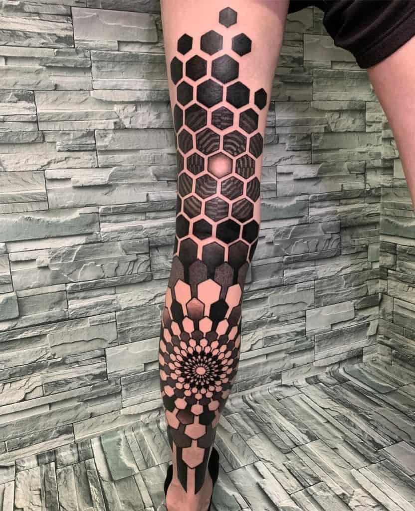 Hexagon-oriented back leg sacred geometry tattoo
