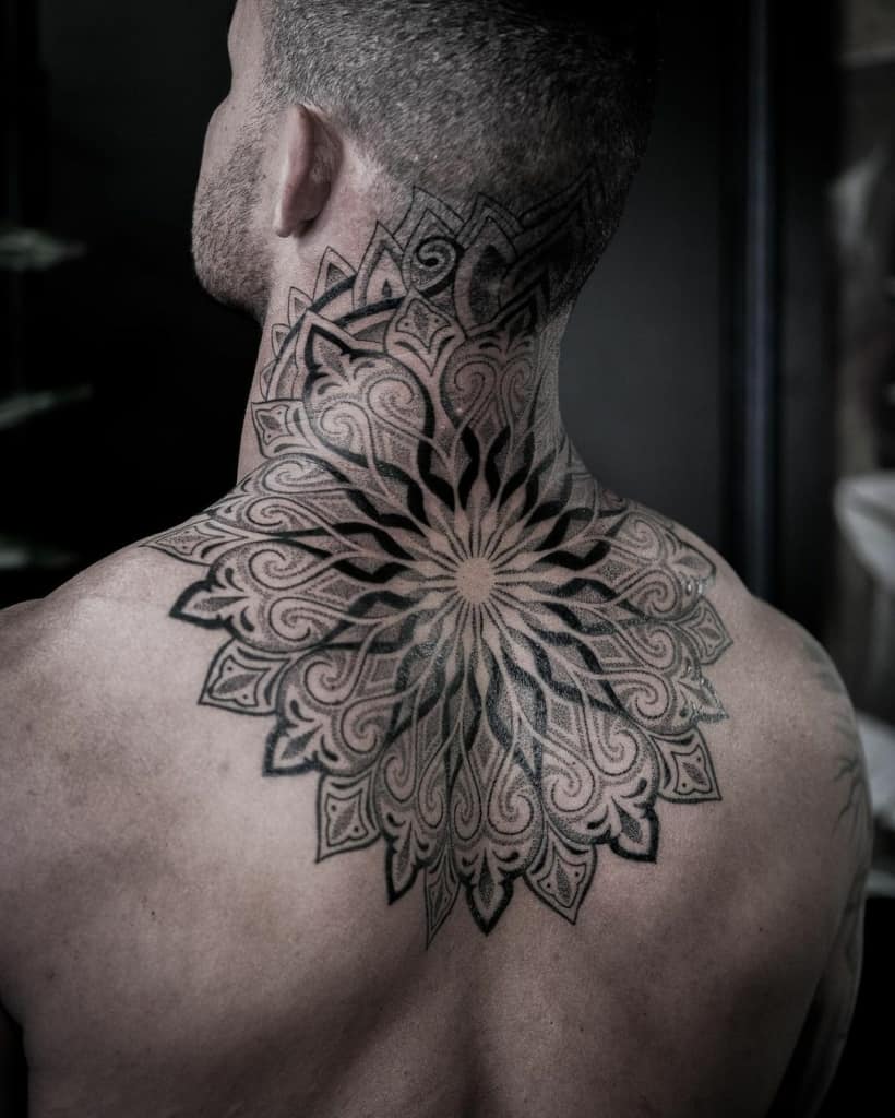 Back neck geometric tattoo