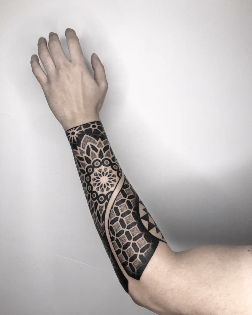 Sacred geometry forearm tattoo design