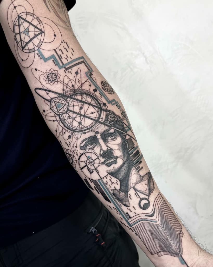Artistic sacred geometry inner arm tattoo