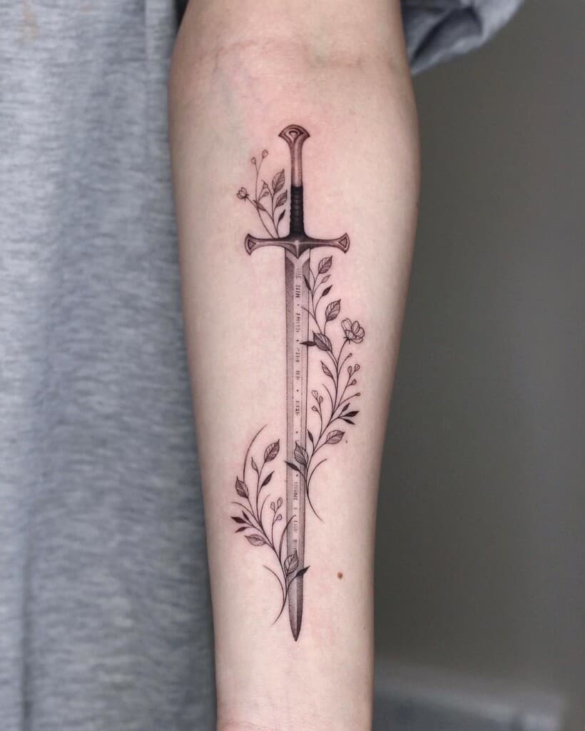 Sword and flower tattoo on the arm  Tattoogridnet